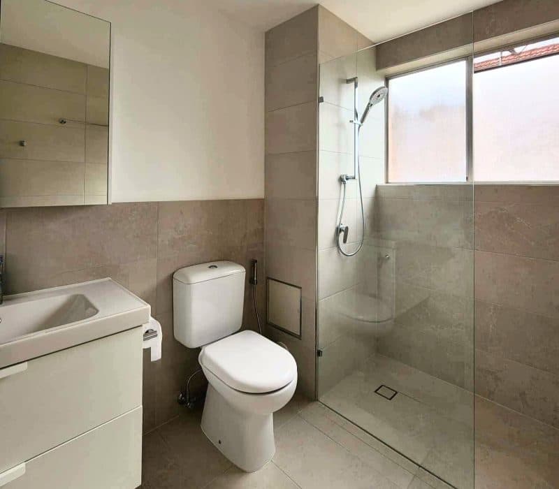 Spa-style white bathroom in Moorooka